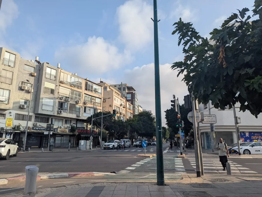 Apartment buildings at a street crossing near the Tel Aviv Port