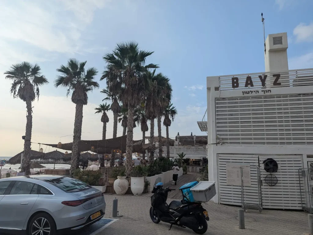 BAYZ sign with palm trees at Hilton Beach