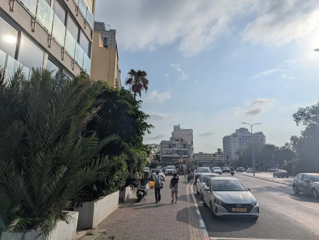 Hayarkon Street sidewalk with greenery in north Tel Aviv