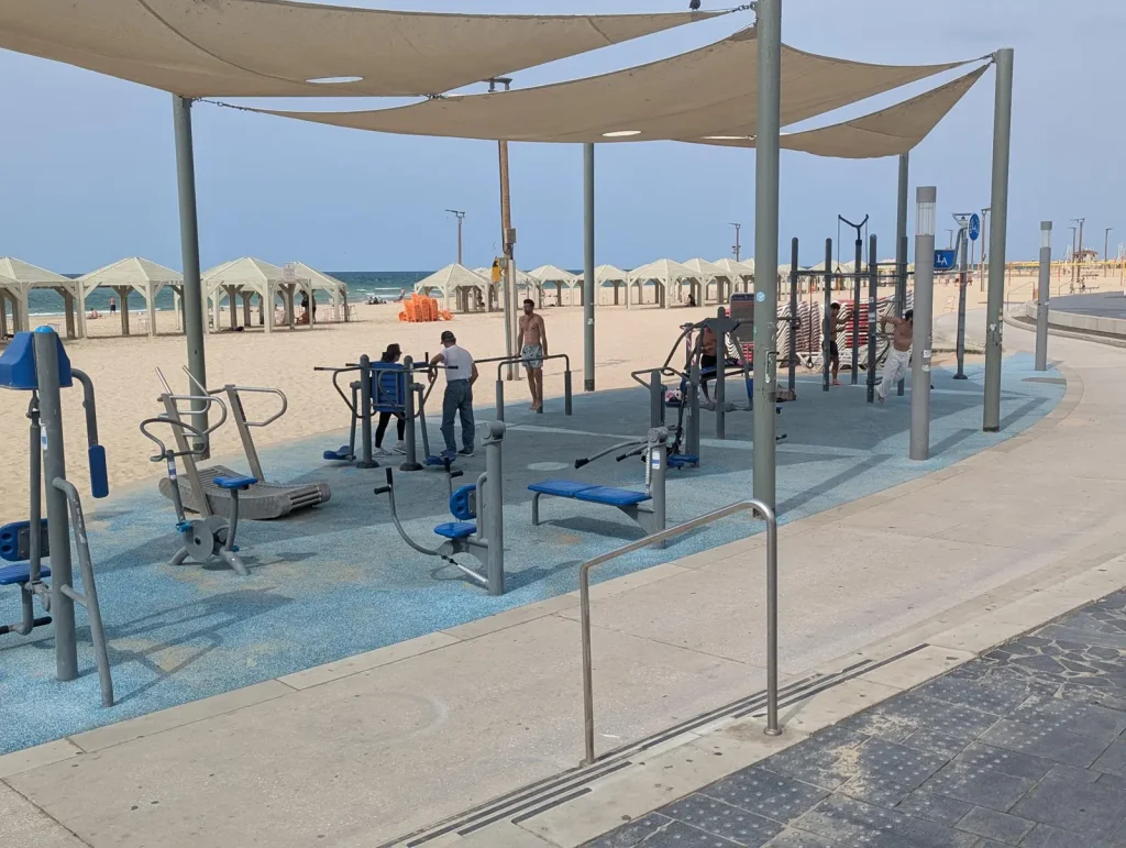 Shaded outdoor gym on the promenade at Jerusalem Beach