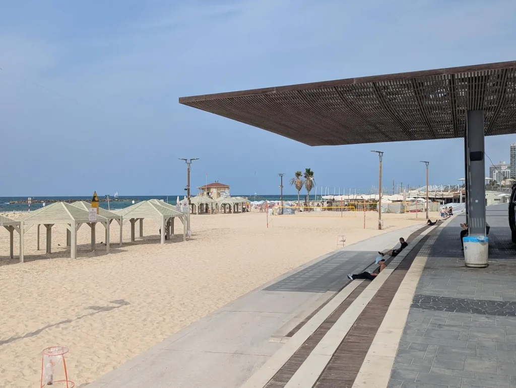 Promenade shade canopy and beach huts at Jerusalem Beach