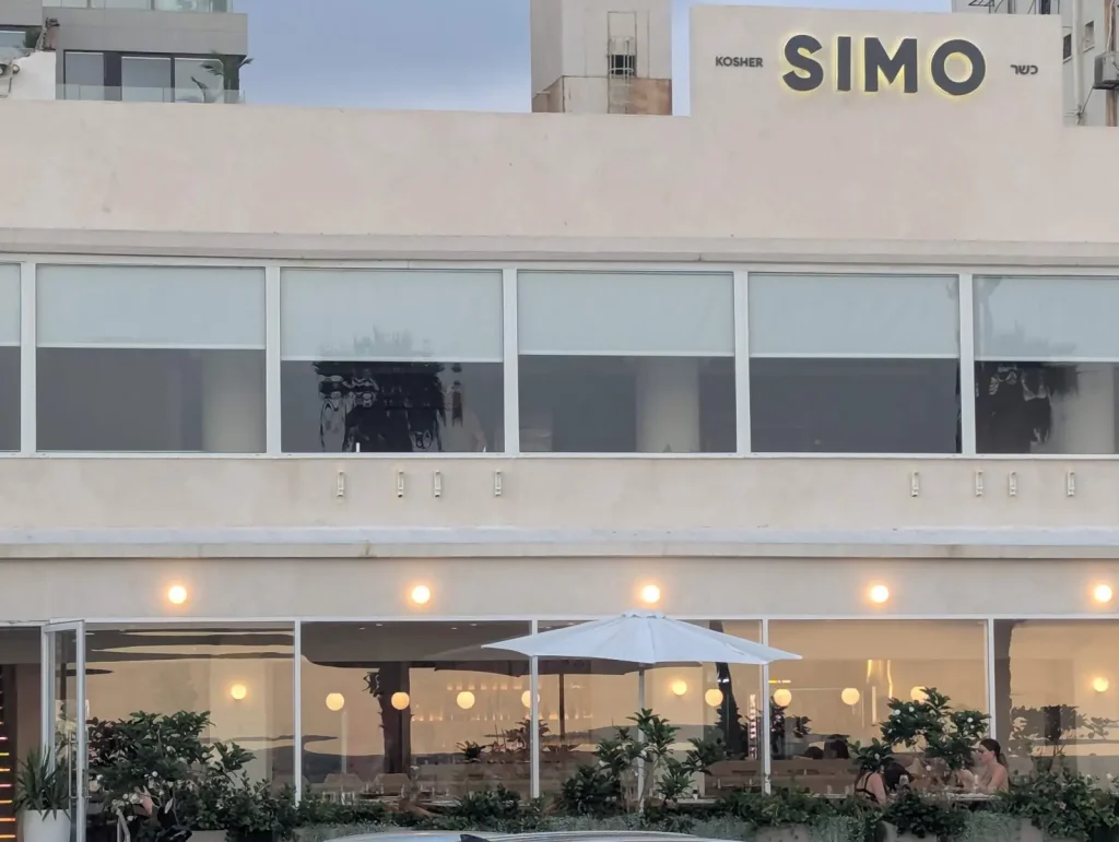 SIMO kosher meat restaurant sign on the Tel Aviv seafront